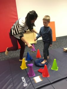 kid training with cones at Physical Therapy in Southington