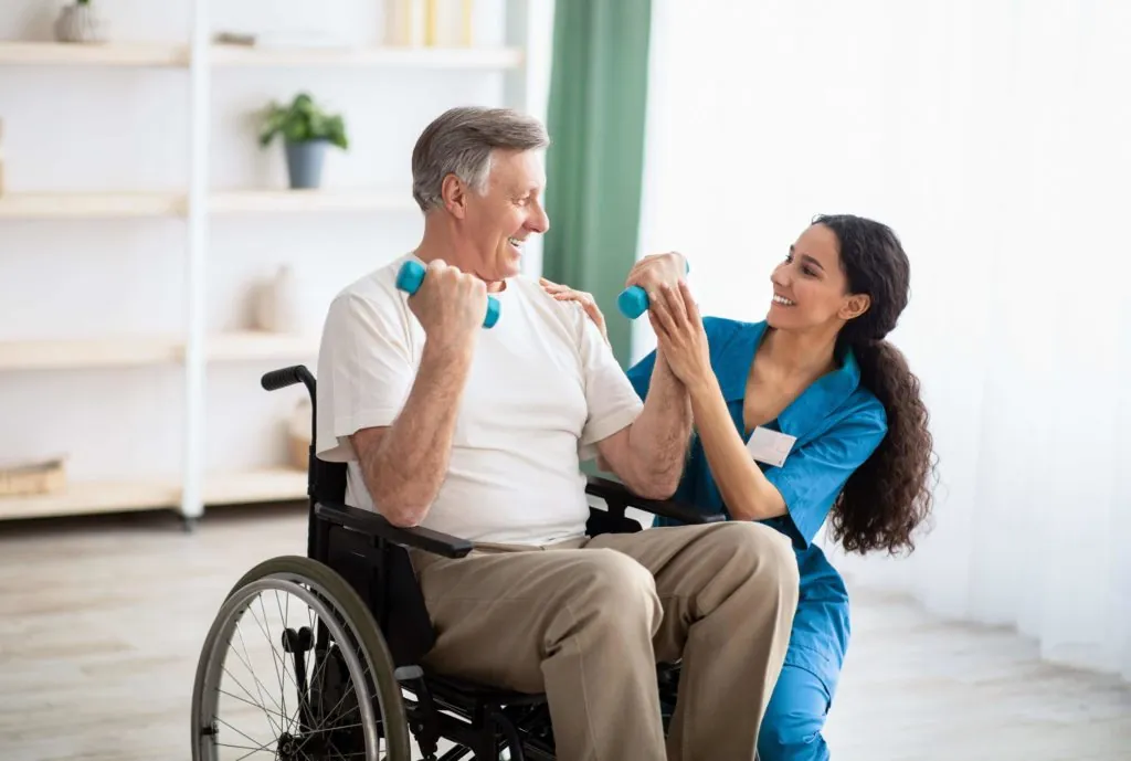 senior citizen doing exercises in physical therapy