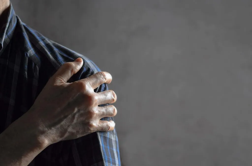 man with limited range of motion in his shoulder